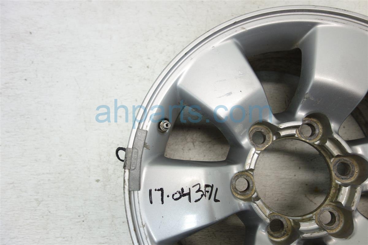 $65 Toyota FR/L WHEEL/RIM - HAS LIGHT SCRATCHES