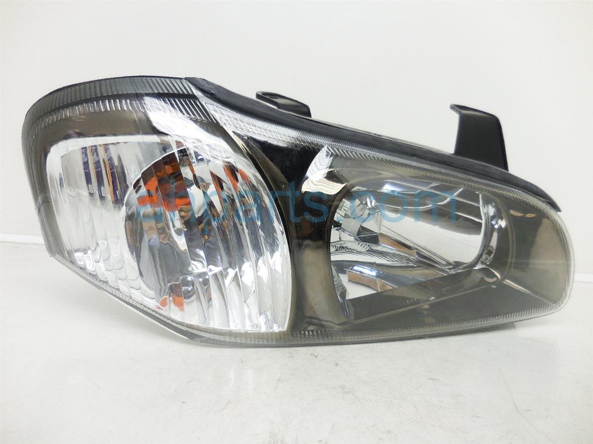 $35 Nissan RH Headlamp - Aftermarket - Tint