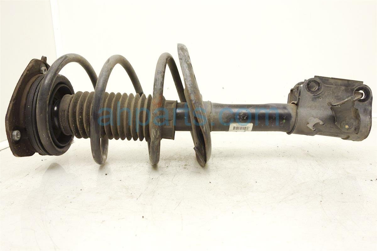 $65 Nissan FR/LH SHOCK/STRUT, ABS