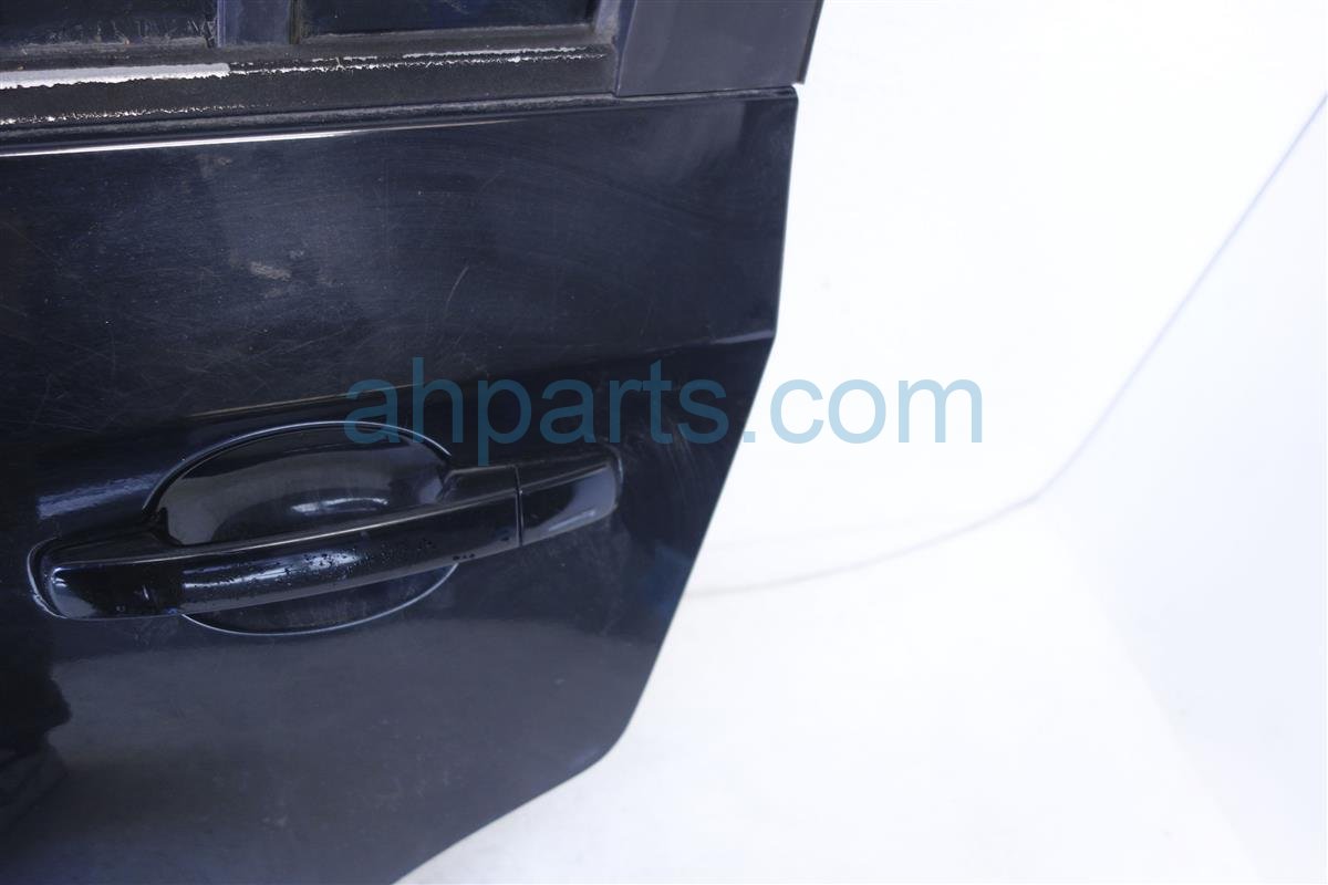 $125 Nissan RR/LH DOOR ASSEMBLY - BLACK