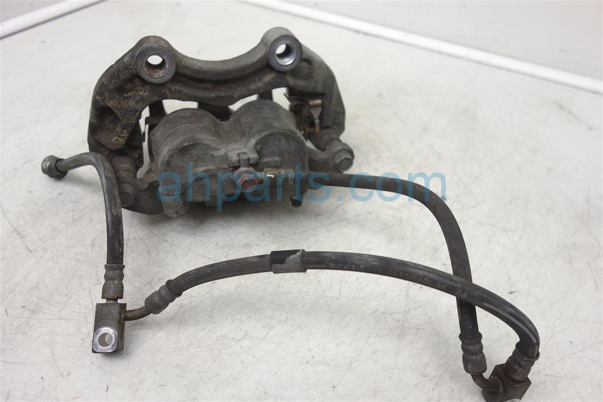 $35 Nissan FR/LH BRAKE CALIPER, NON-BREMBO