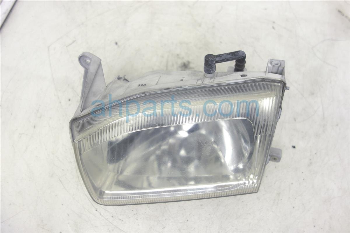 $45 Nissan FR/LH HEADLIGHT ASSY