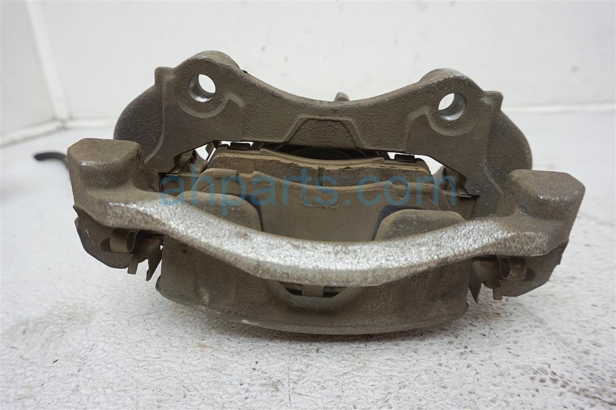 $35 Nissan FR/LH BRAKE CALIPER -