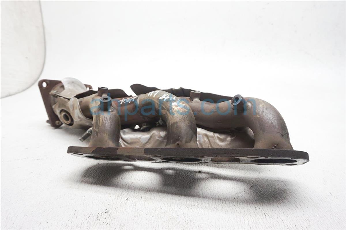 $85 Nissan LEFT EXHAUST MANIFOLD