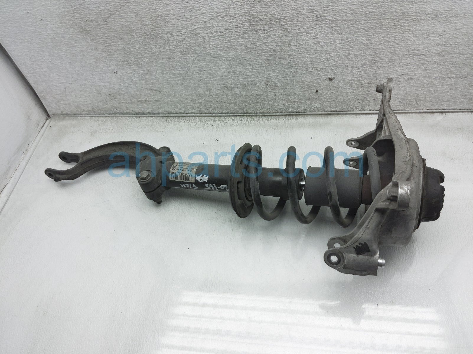 $75 Audi FR/LH STRUT + SPRING