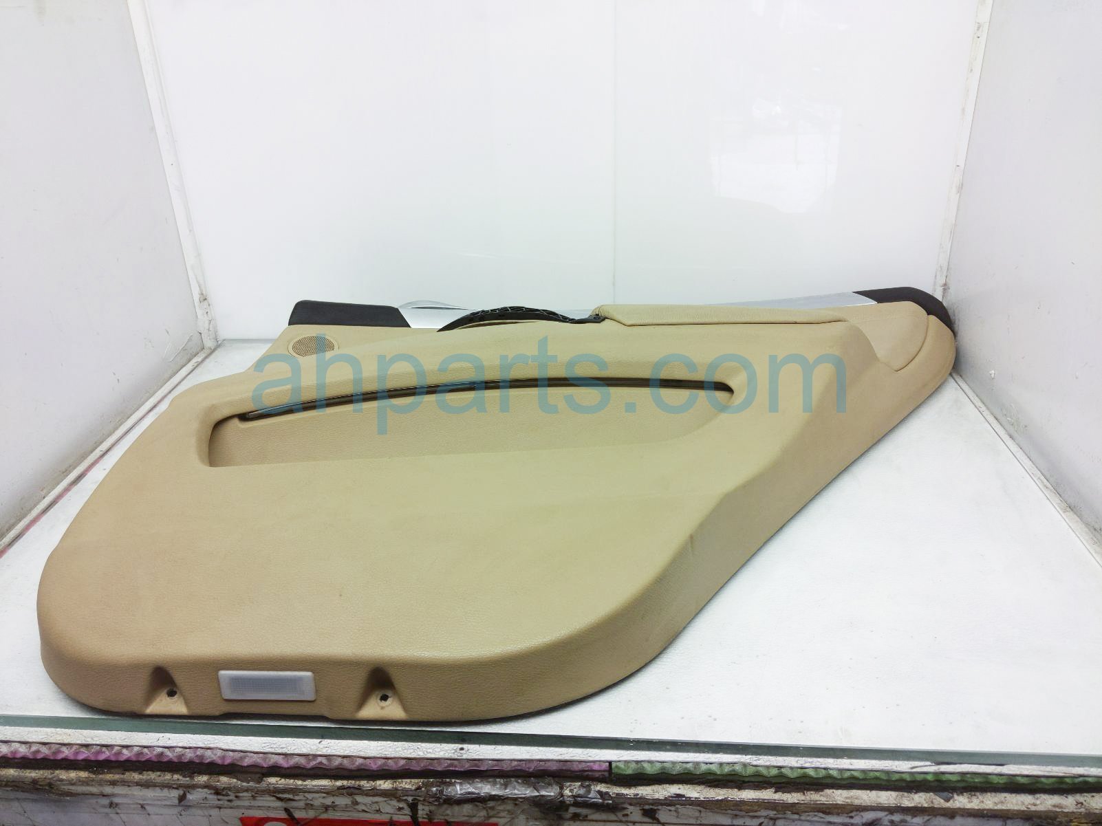 $125 BMW RR/RH INTERIOR DOOR PANEL - TAN