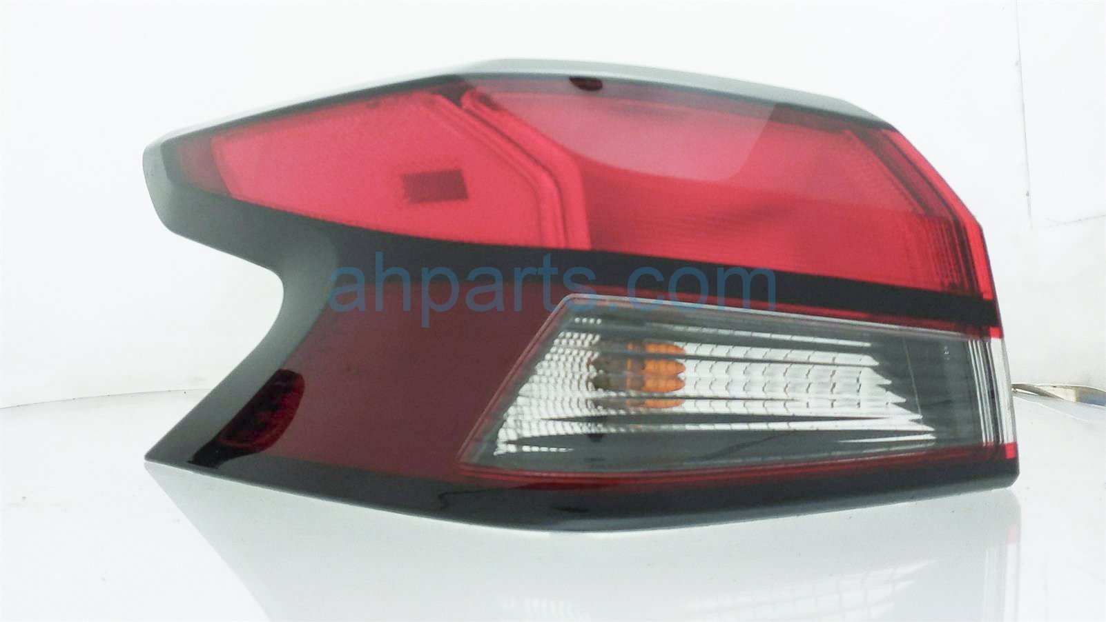 $149 Nissan LH TAIL LAMP (ON BODY)