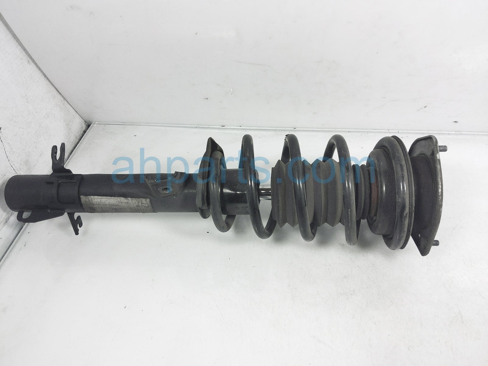 $60 BMW FR/LH STRUT + SPRING