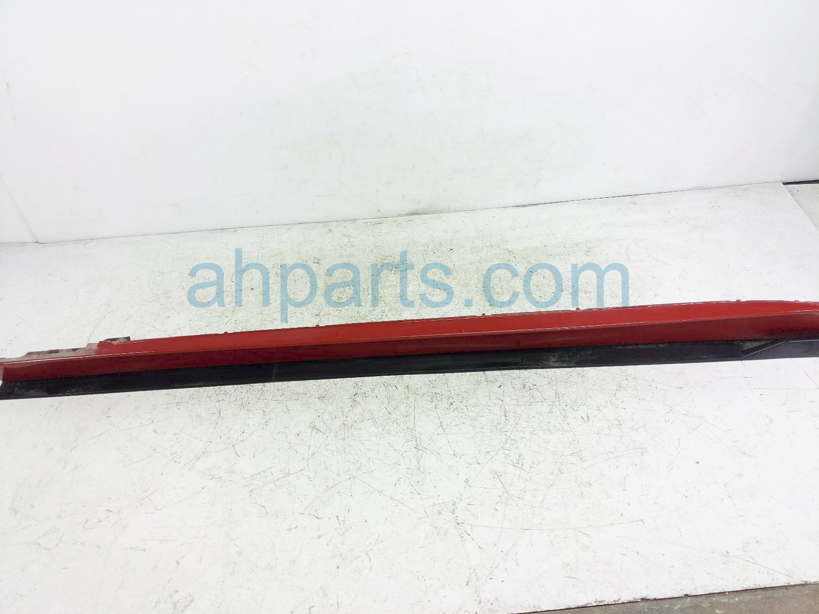 $75 BMW LH SIDE SKIRT / MOLDING - RED