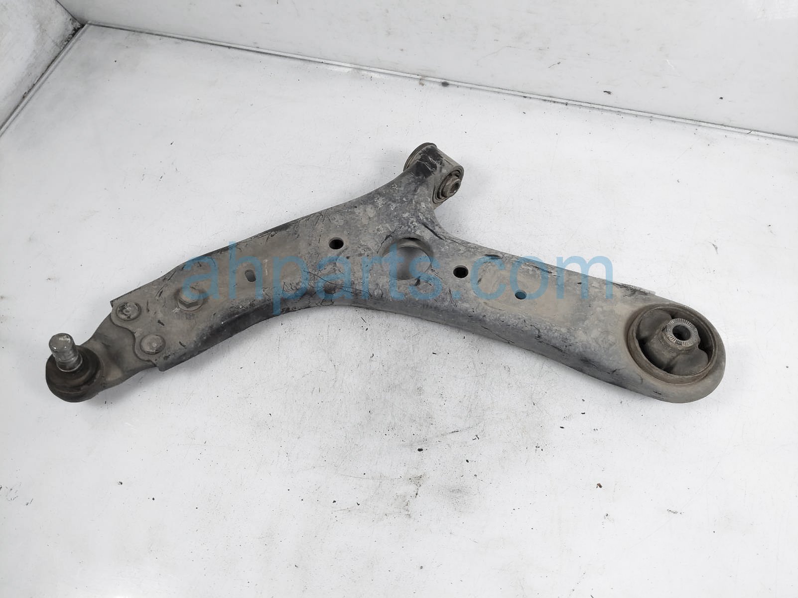 $70 Kia FR/LH LOWER CONTROL  ARM