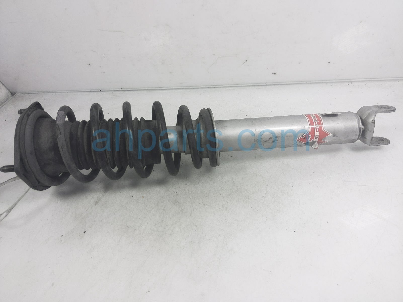 $90 Mazda FR/LH STRUT + SPRING