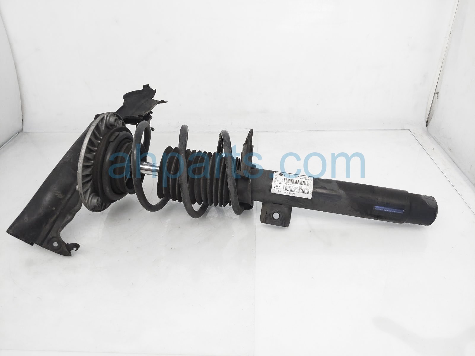 $100 BMW FR/LH STRUT + SPRING