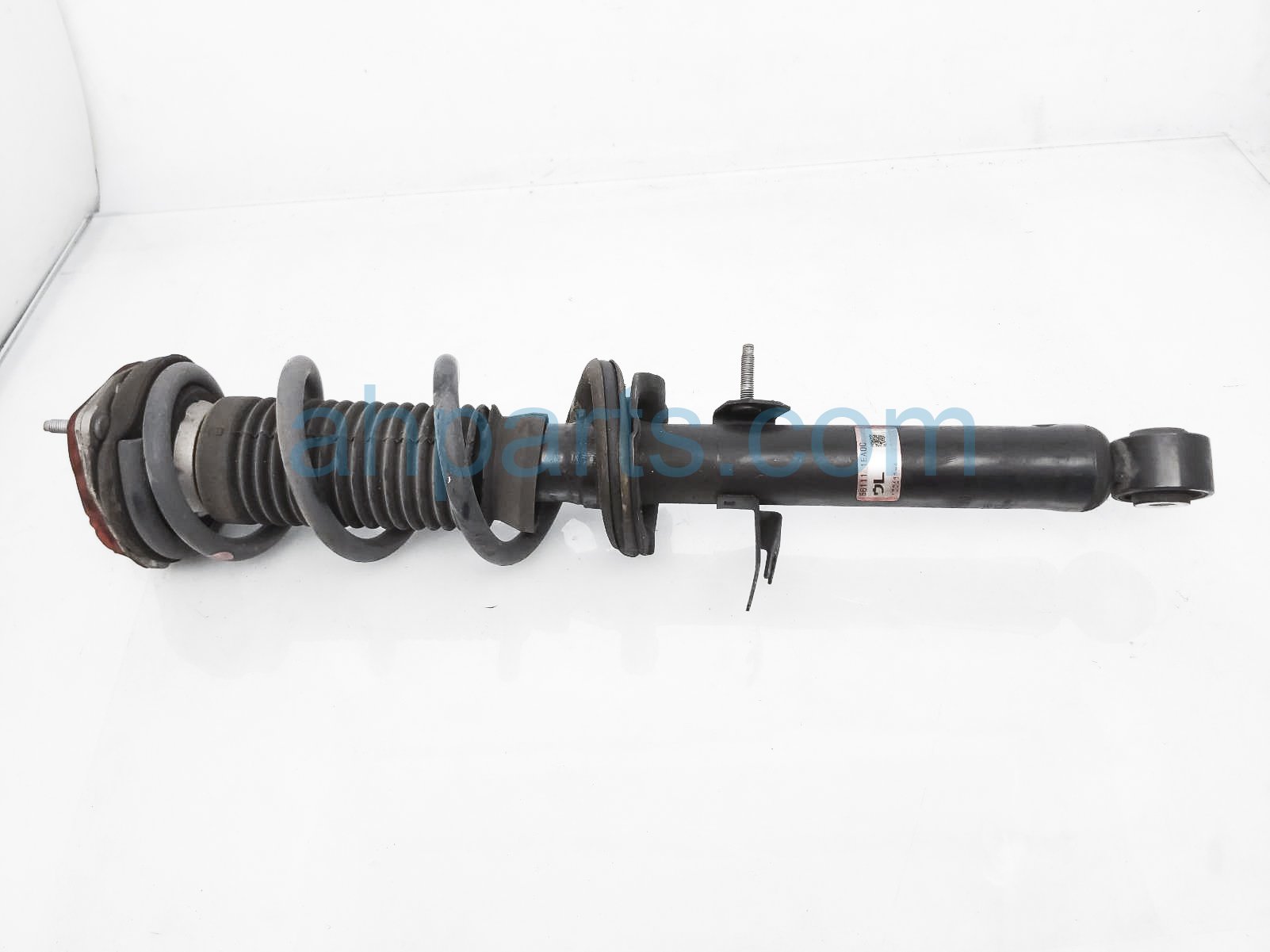 $45 Nissan FR/LH STRUT + SPRING