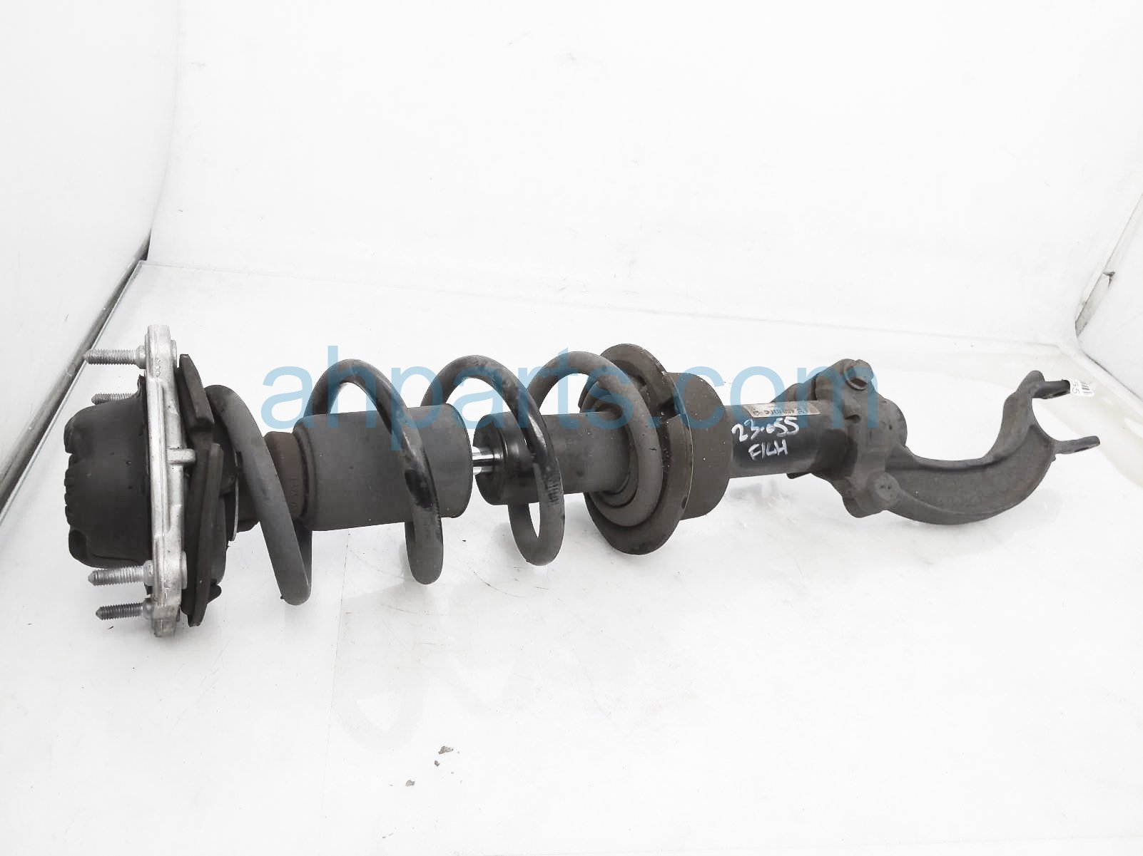 $75 Audi FR/LH STRUT + SPRING