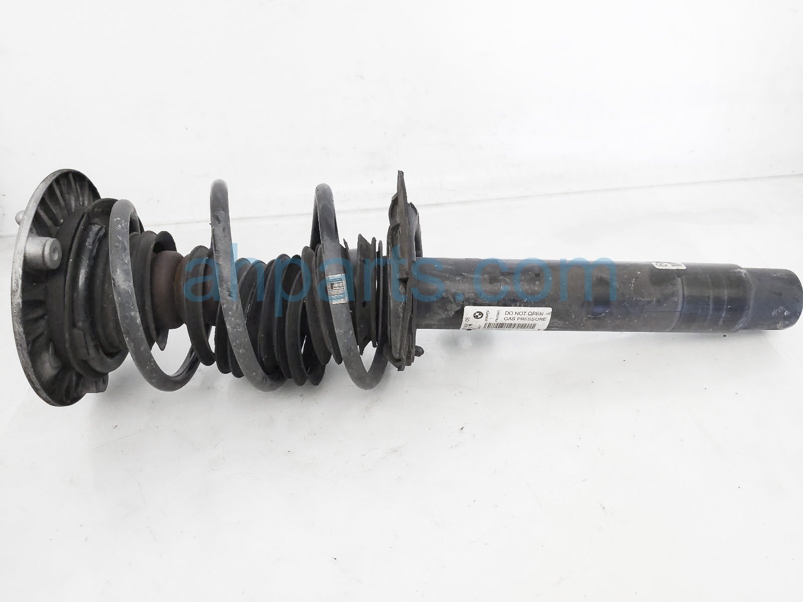 $125 BMW FR/RH STRUT + SPRING