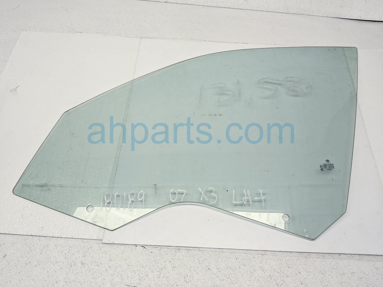 $75 BMW FR/LH DOOR GLASS WINDOW