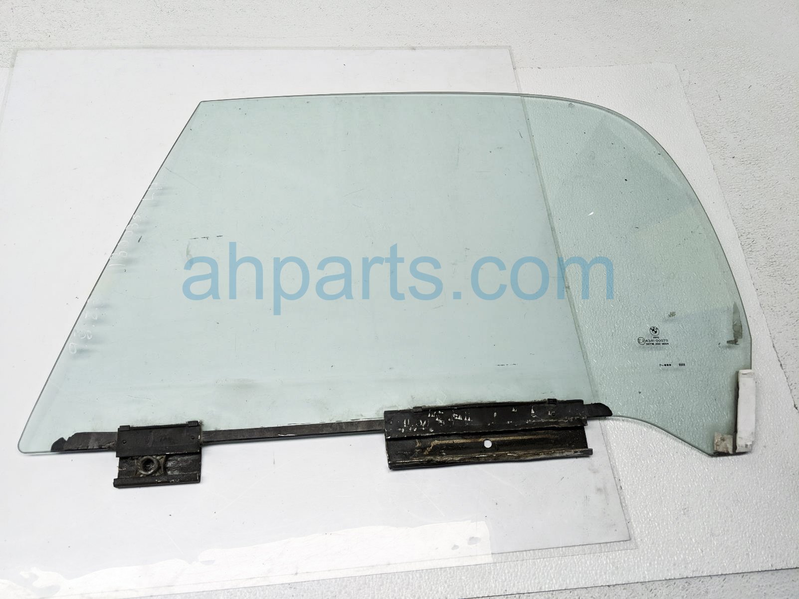 $75 BMW LH DOOR GLASS WINDOW