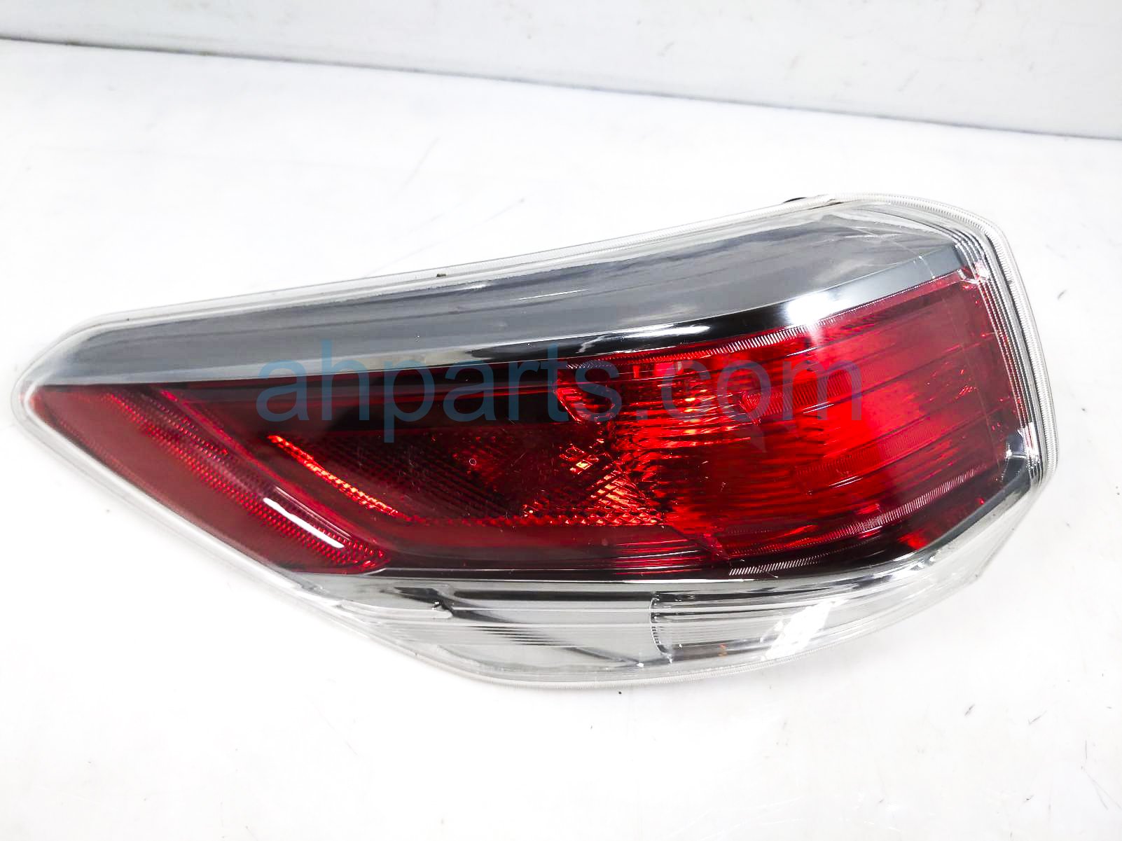 $100 Toyota LH TAIL LAMP (ON BODY)