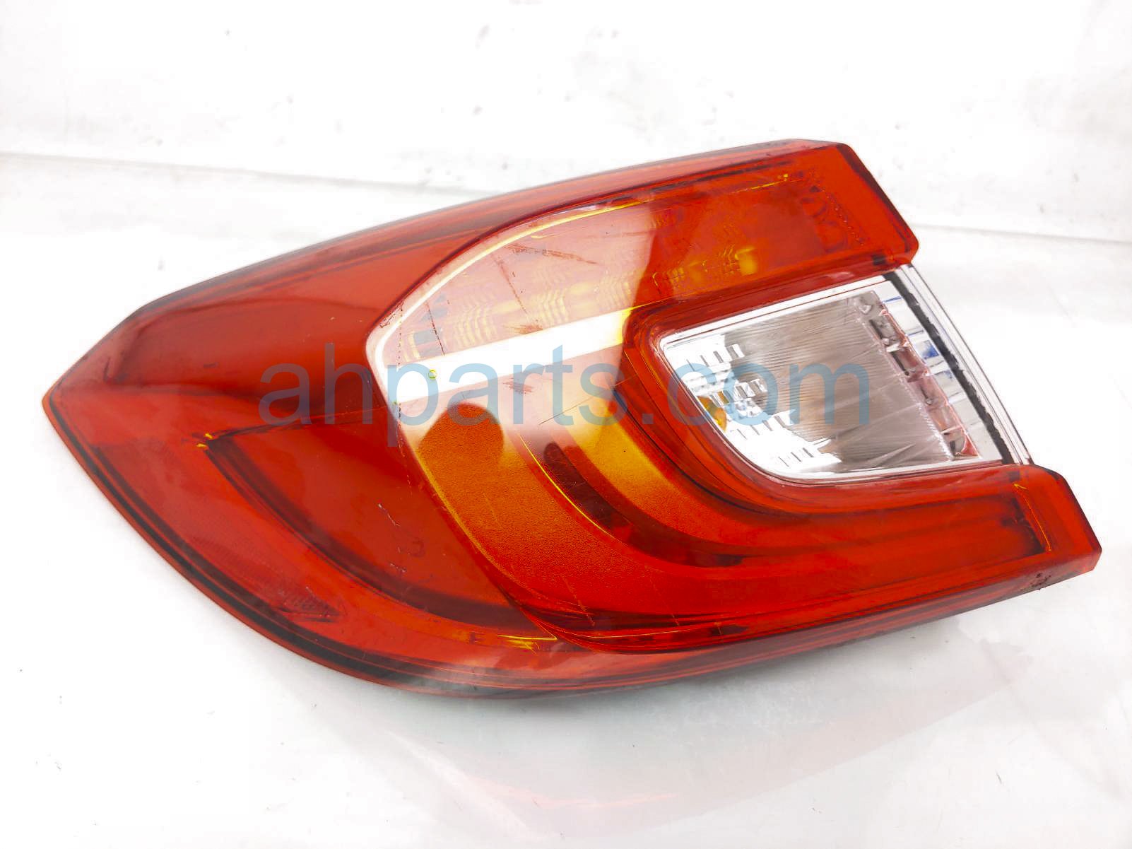 $195 Honda LH TAIL LAMP (ON BODY)