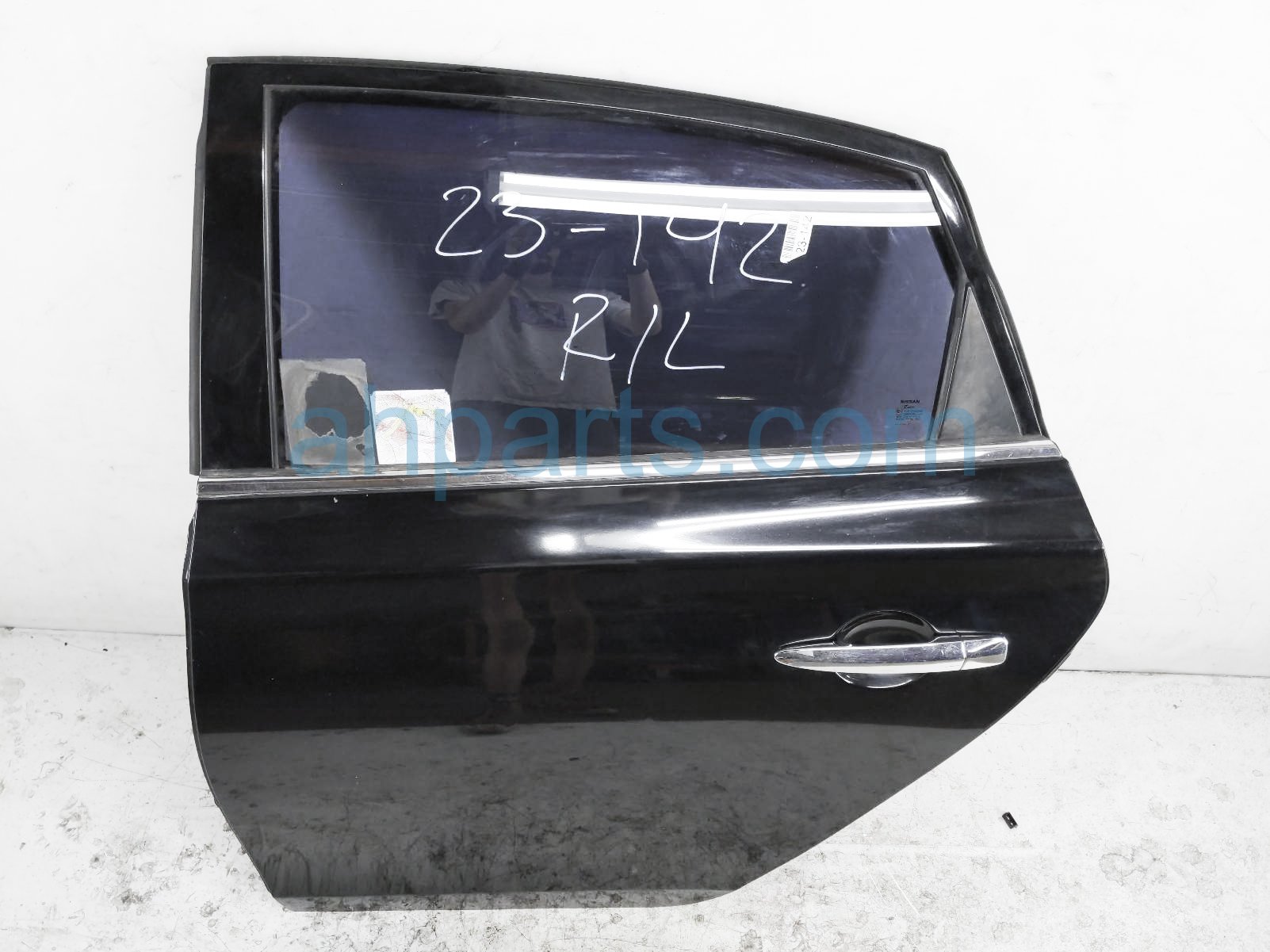 $199 Nissan RR/LH Door Assy - BLK