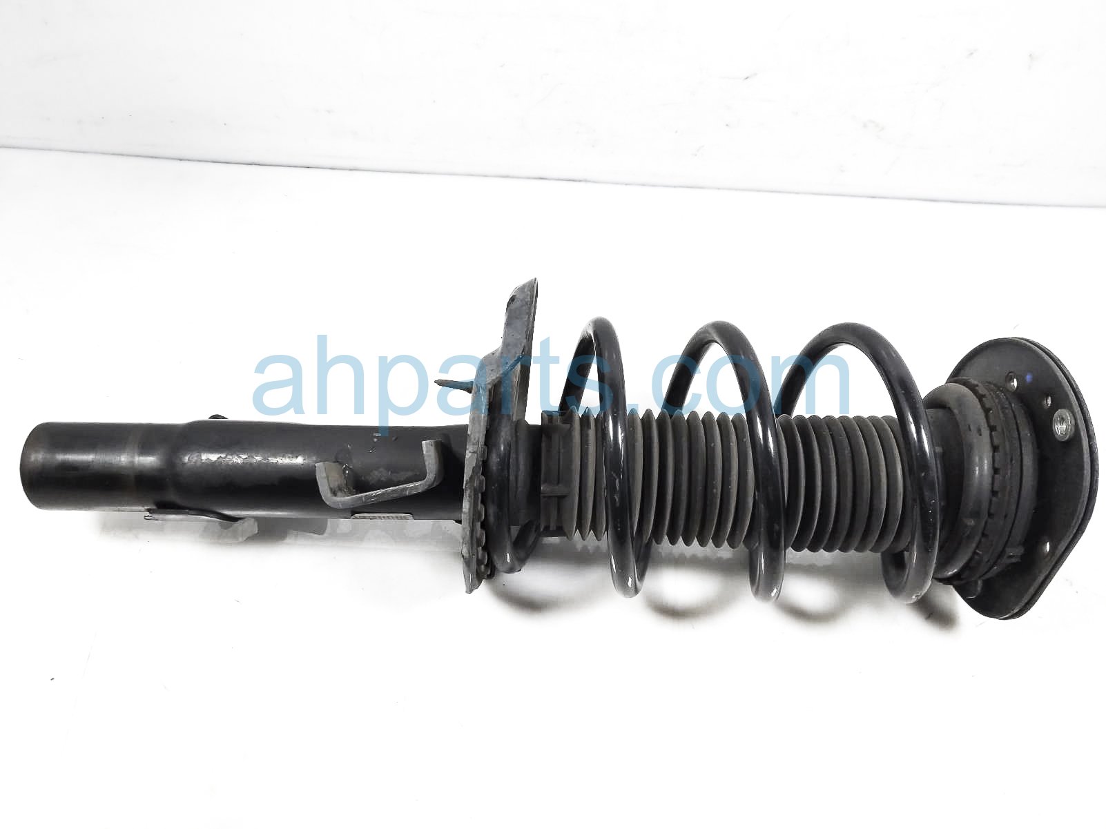 $75 Volvo FR/LH STRUT + SPRING