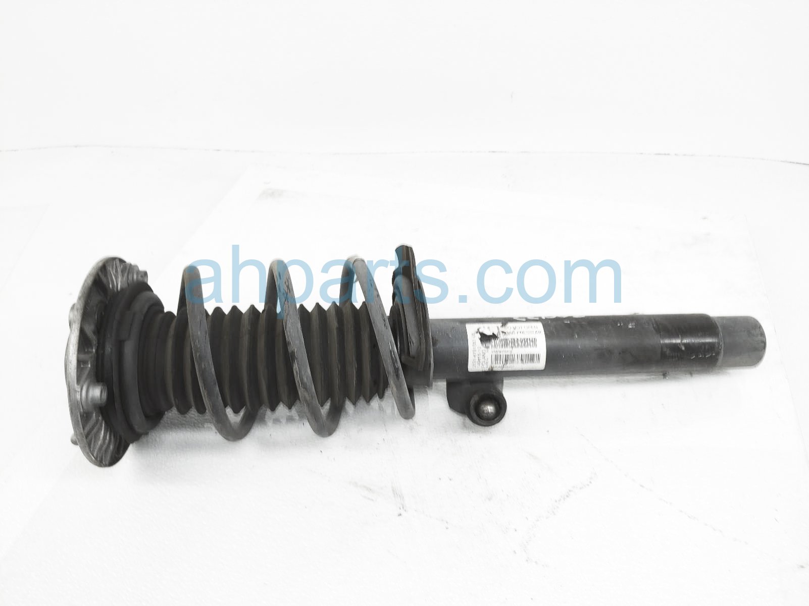 $125 BMW FR/RH STRUT + SPRING