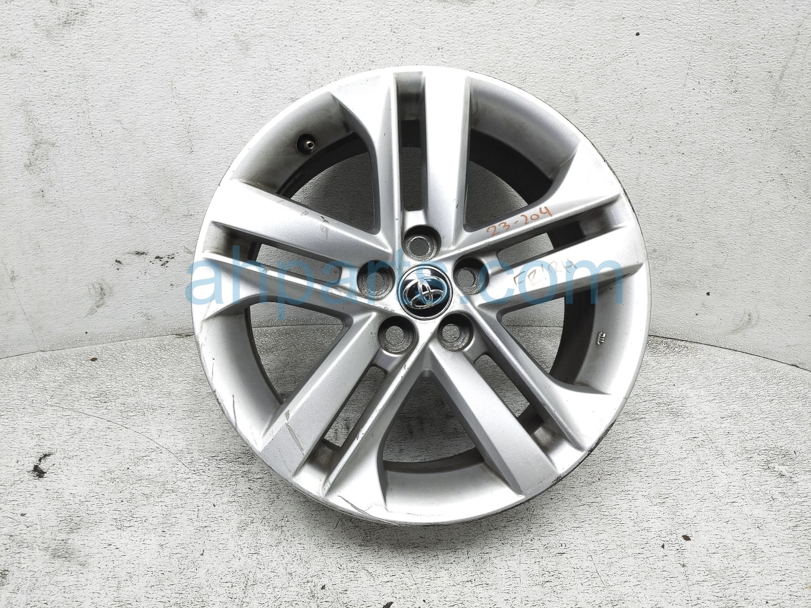 $109 Toyota FR/RH WHEEL / RIM - LIGHT CURB