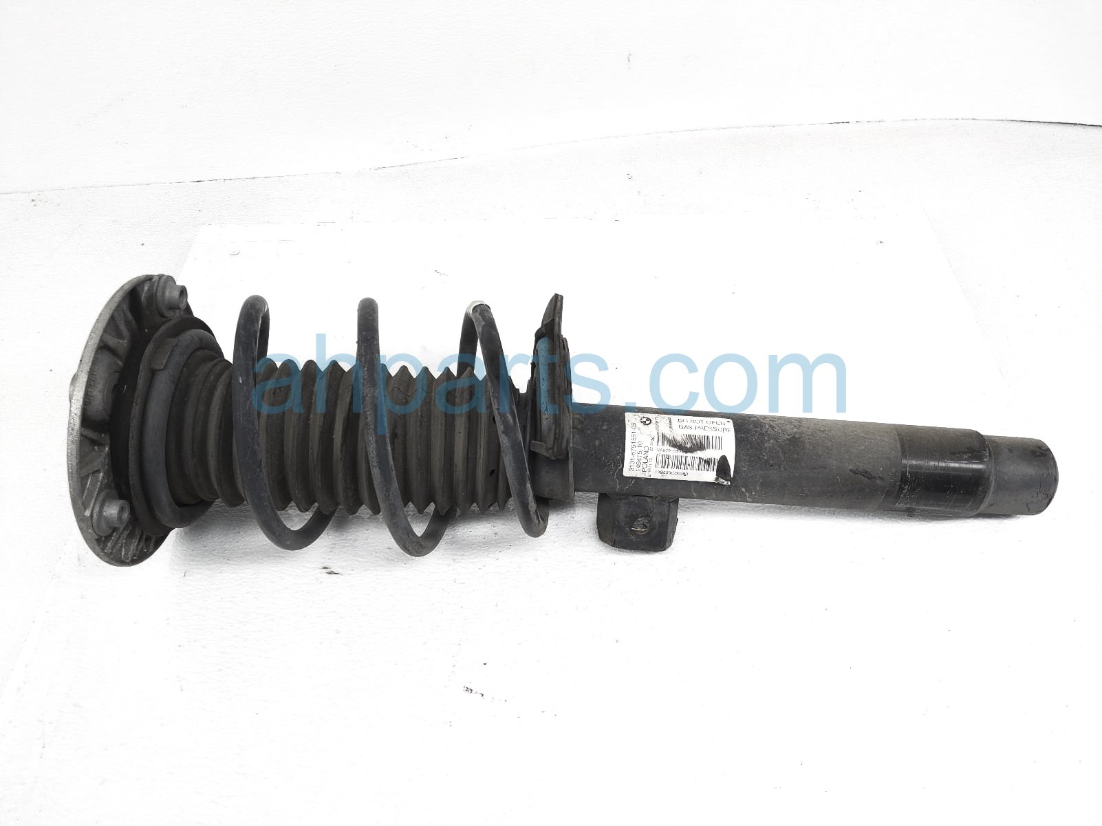 $125 BMW FR/RH STRUT + SPRING