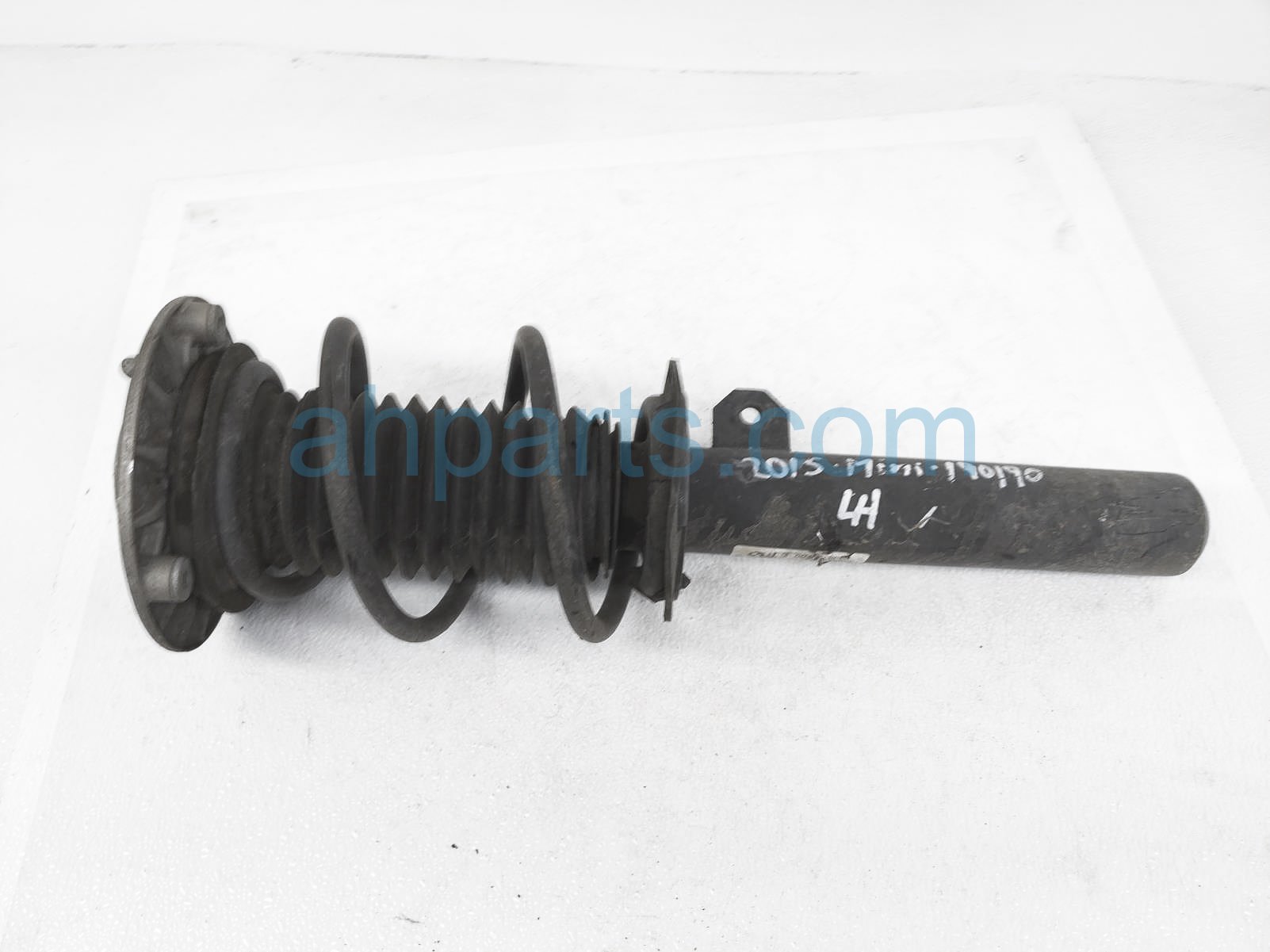 $150 BMW FR/LH STRUT + SPRING