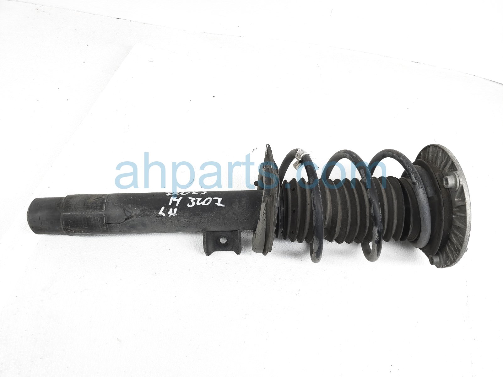 $125 BMW FR/LH STRUT + SPRING ASSY