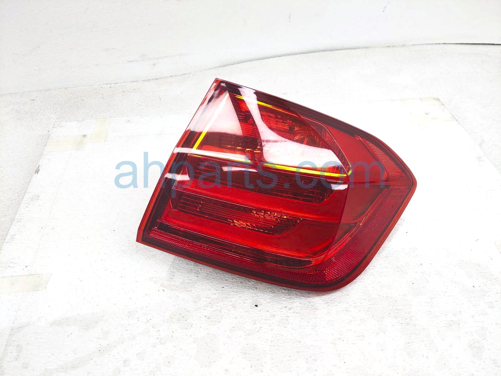 $70 BMW RH TAIL LAMP (ON BODY)