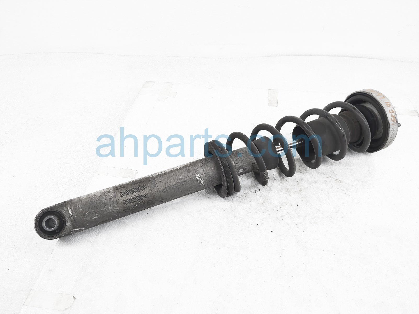 $65 BMW RR/LH STRUT + SPRING