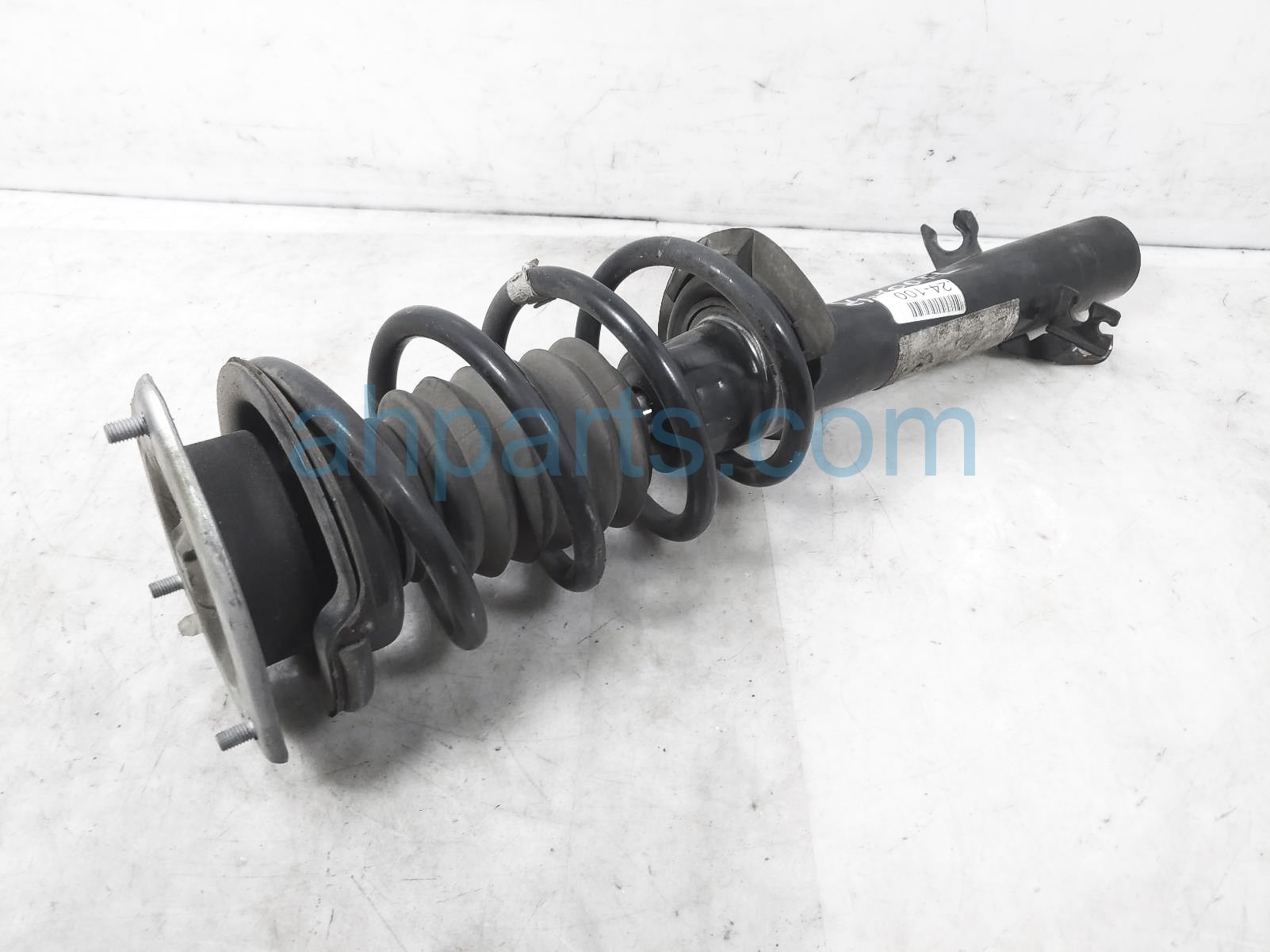 $60 BMW FR/LH STRUT + SPRING