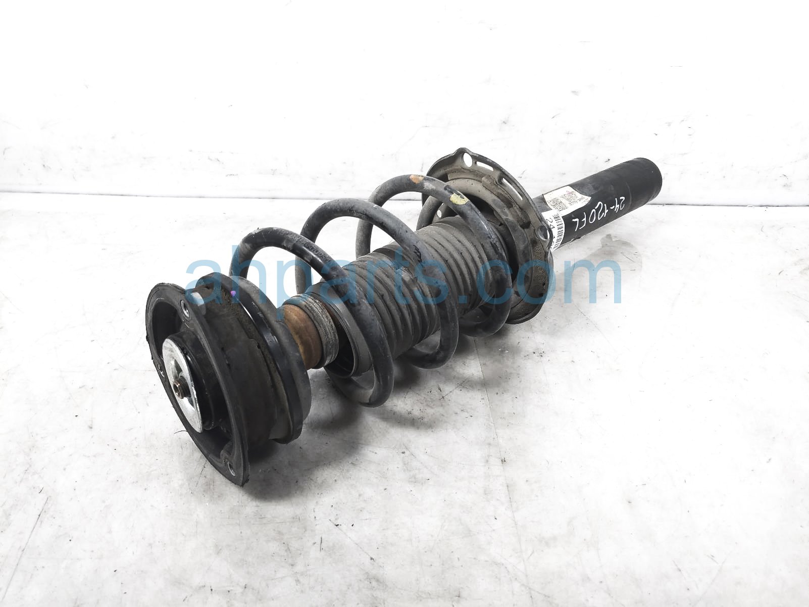 $150 Volkswagen FR/LH STRUT + SPRING