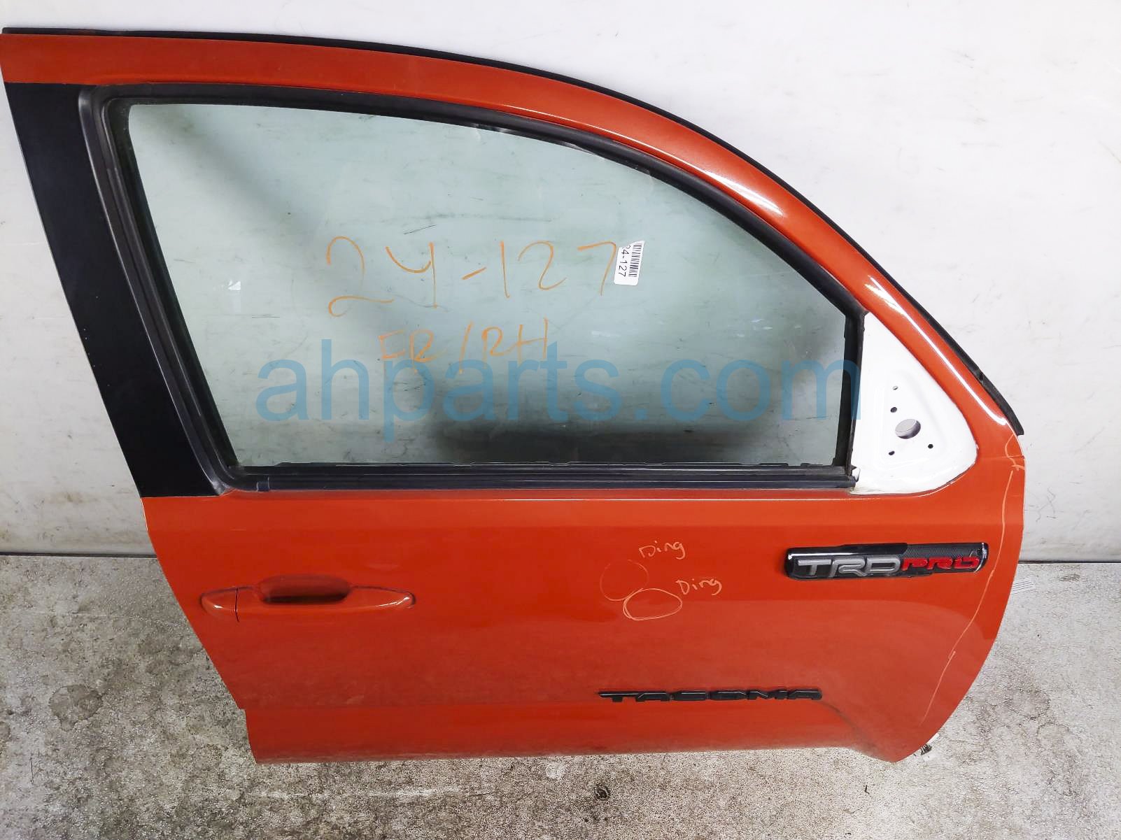 $950 Toyota FR/RH DOOR - ORANGE -NO MIRROR/TRIM*