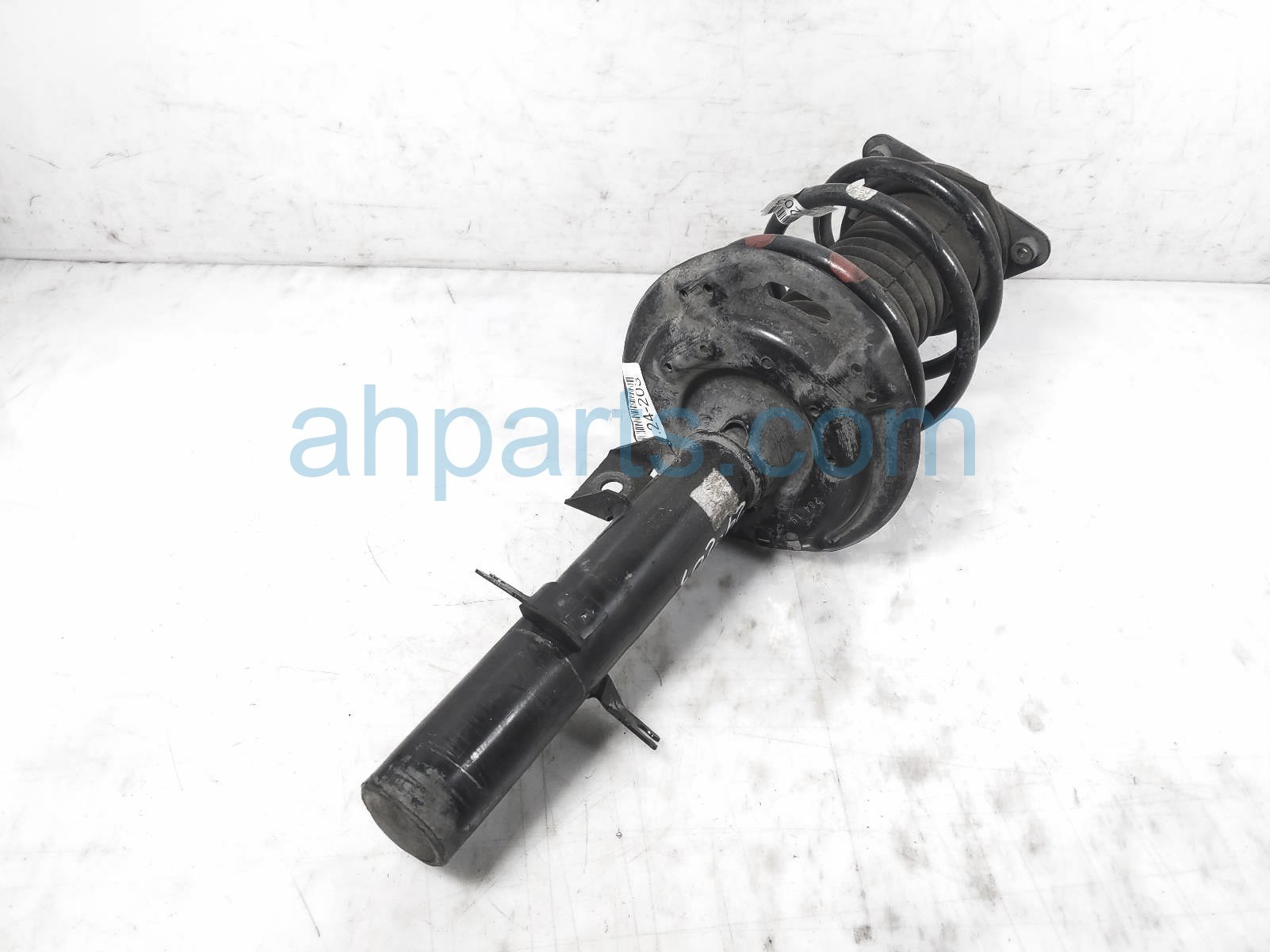 $99 Nissan FR/RH STRUT + SPRING