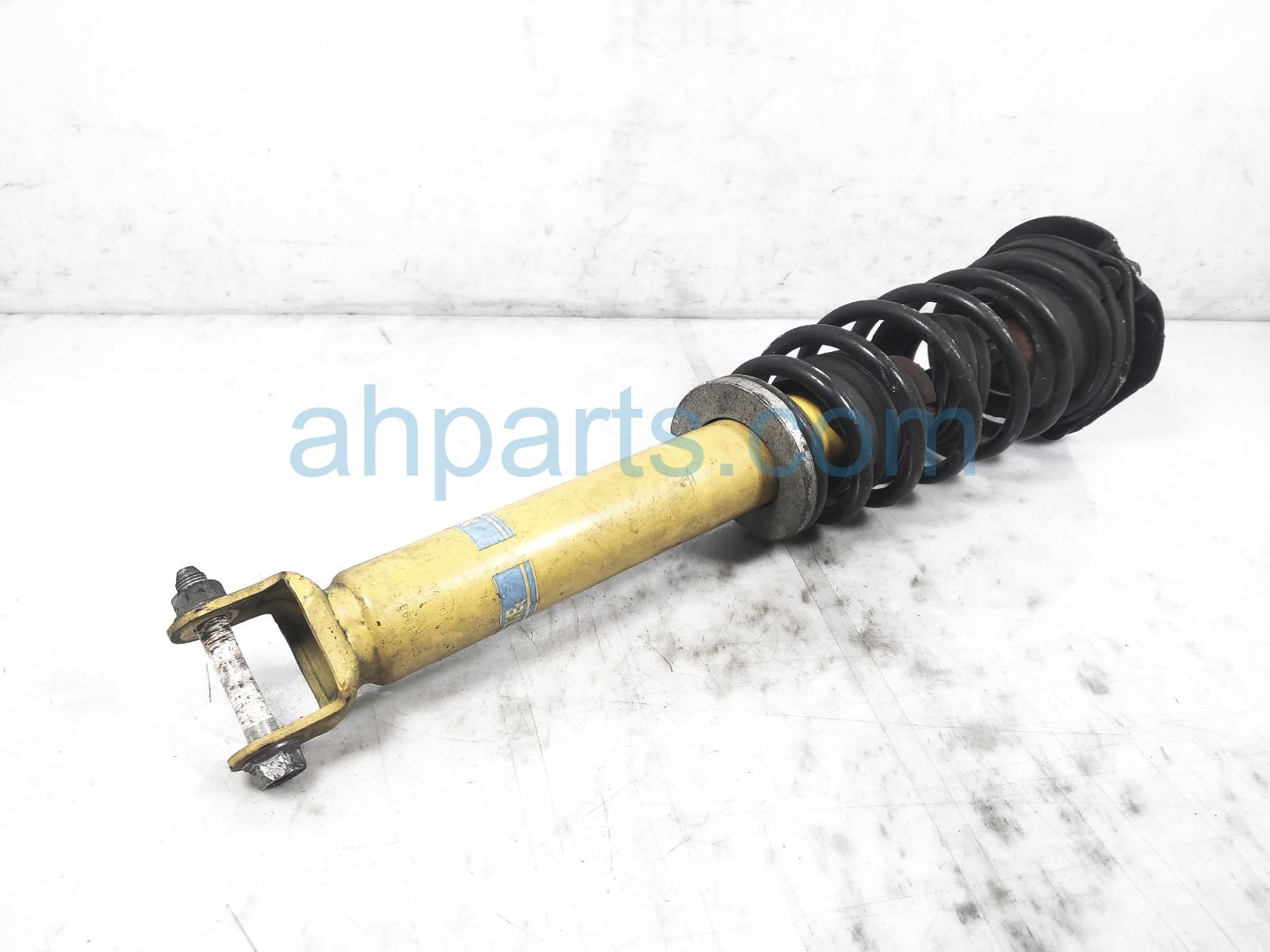 $75 Mazda FR/LH STRUT + SPRING