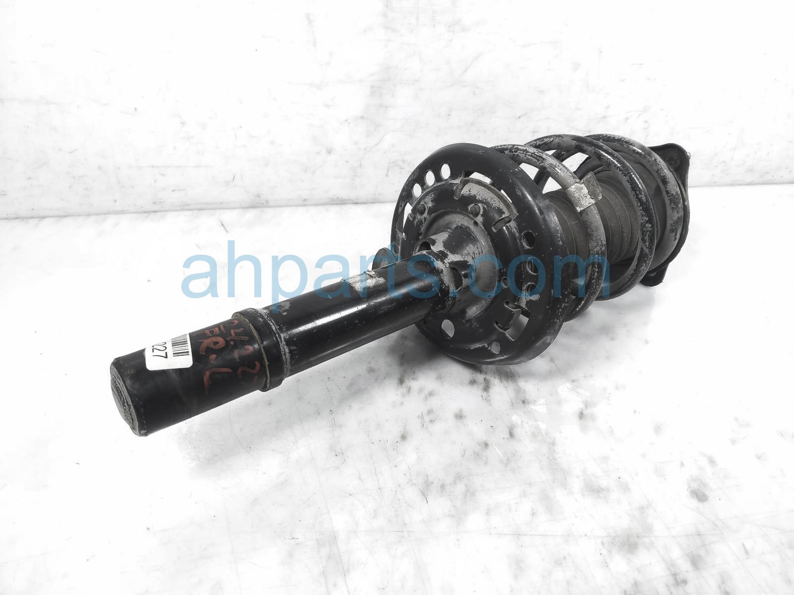 $125 Honda FR/LH STRUT + SPRING