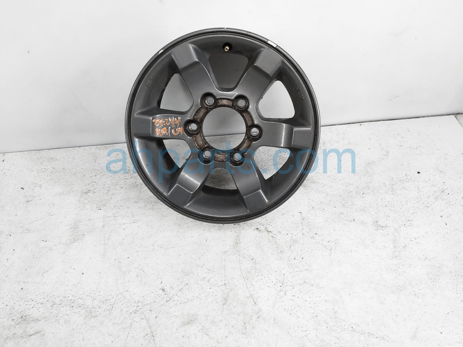 $99 Nissan RR/LH WHEEL / RIM