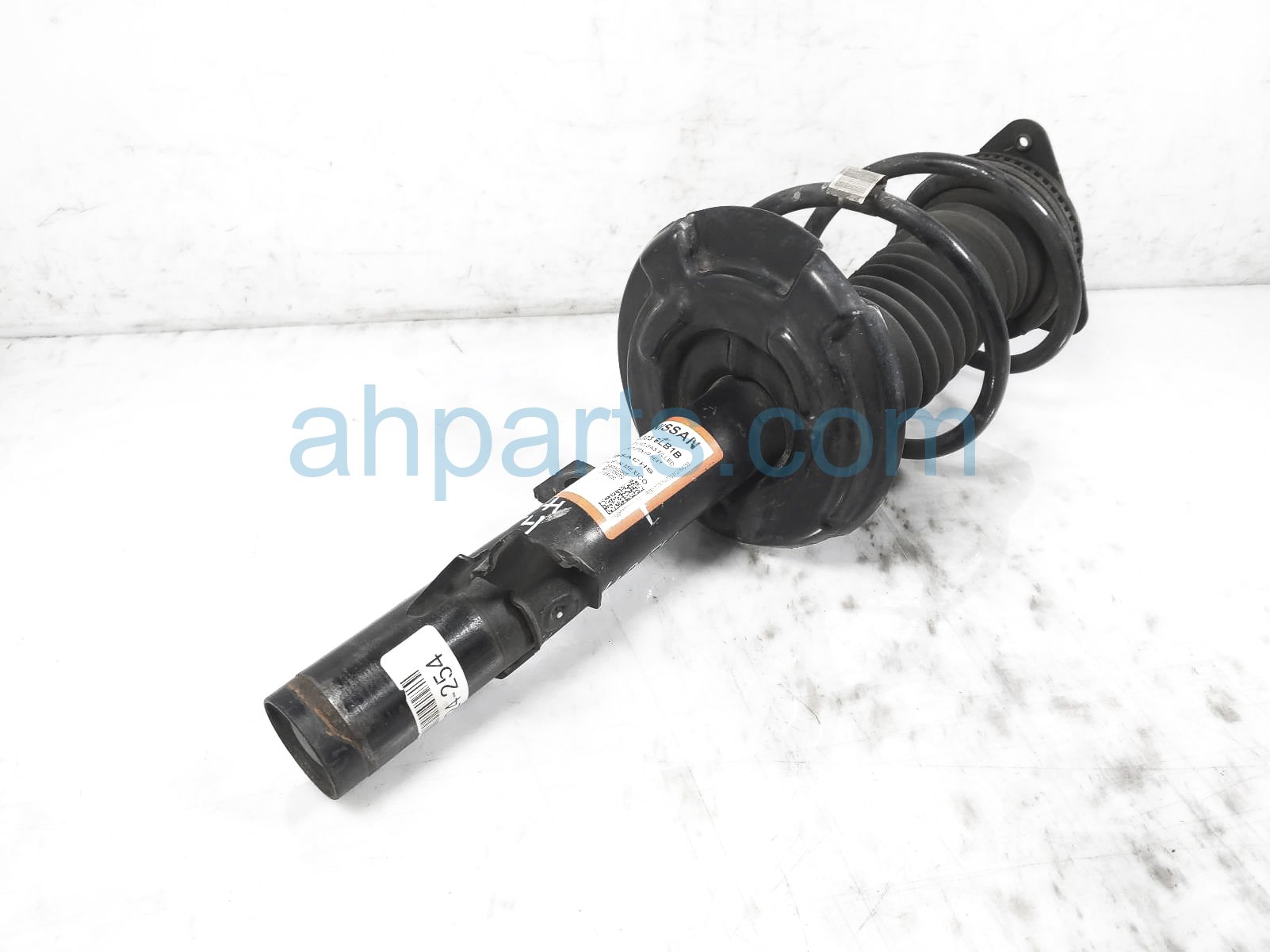 $125 Nissan FR/LH STRUT + SPRING