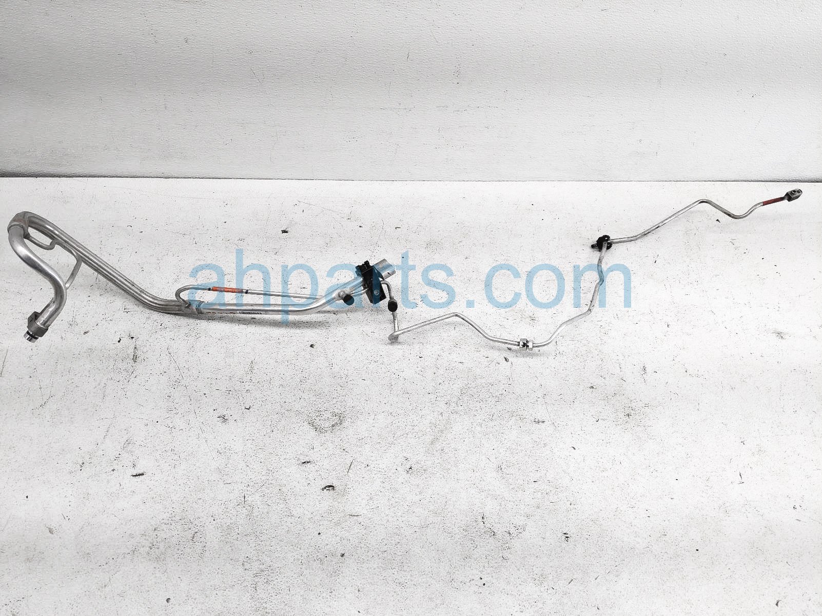 $99 Honda AC HEAT EXCHANGE PIPE ASSY